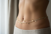 weist chain on a beutiful stomach 